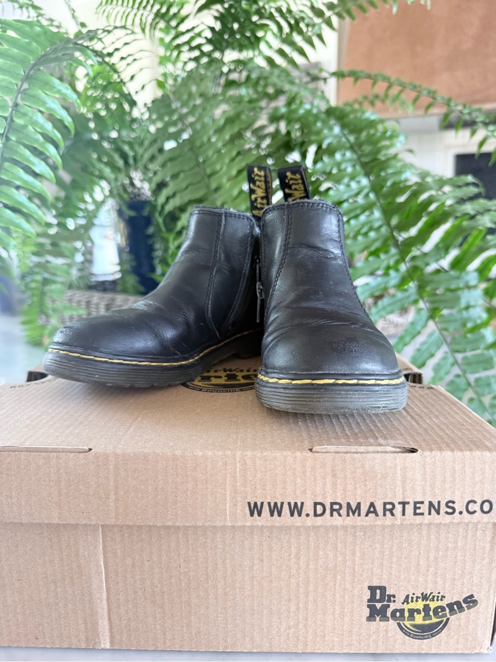 Dr. Martens Black Leather Chelsea Boot Pair with Yellow Stitching